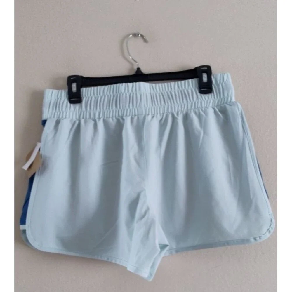 New with tags Women's Reebok Gym Workout Athletic Light Blue Shorts Size L / G